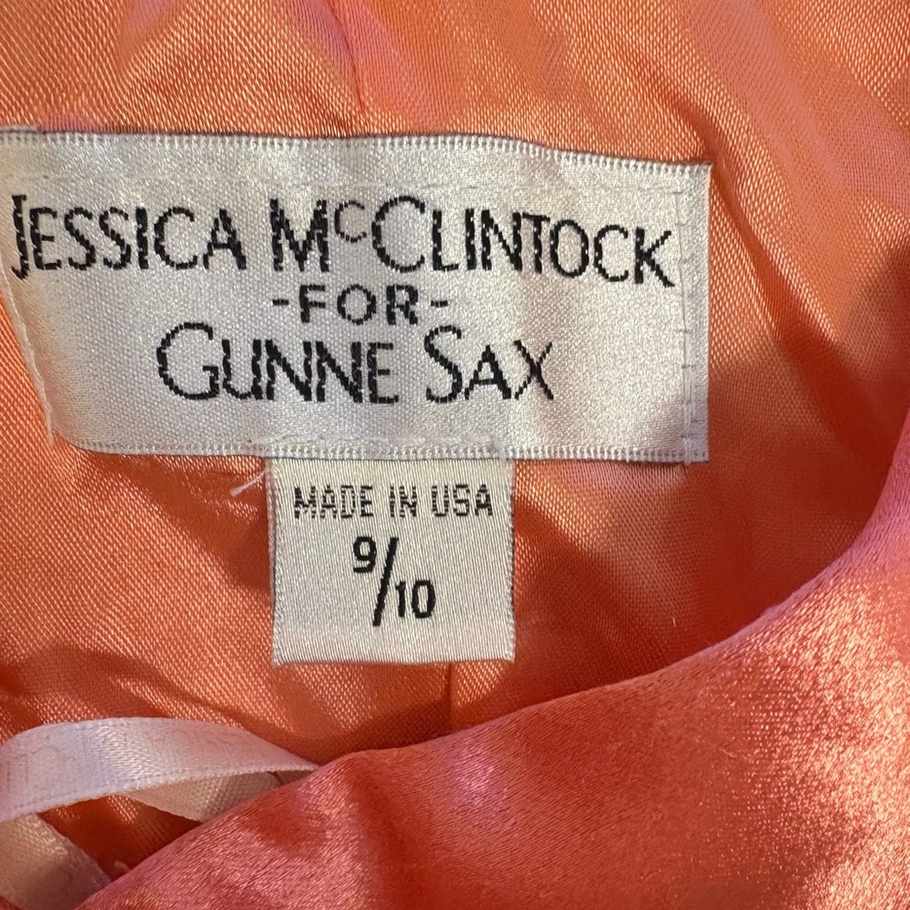 Jessica McClintock Asymmetrical Coral Dress with Floral Accent - Picture 9 of 10